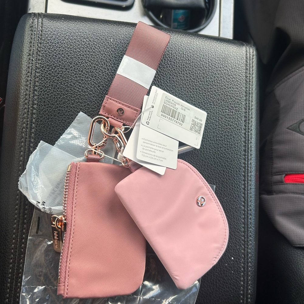 Lululemon Athletica Pink Wristlet with Gold Accents